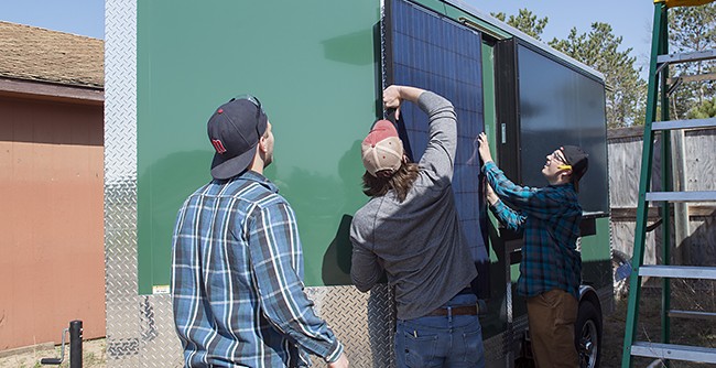 Group of NTC students installing a solar photovoltaic panel onto BSU’s new Fossil Fuel-Free Fish House. Group of NTC students installing a solar photovoltaic panel onto BSU’s new Fossil Fuel-Free Fish House.